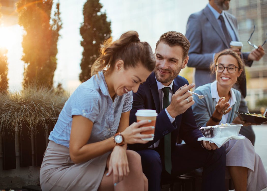 Workers enjoying coffee outside