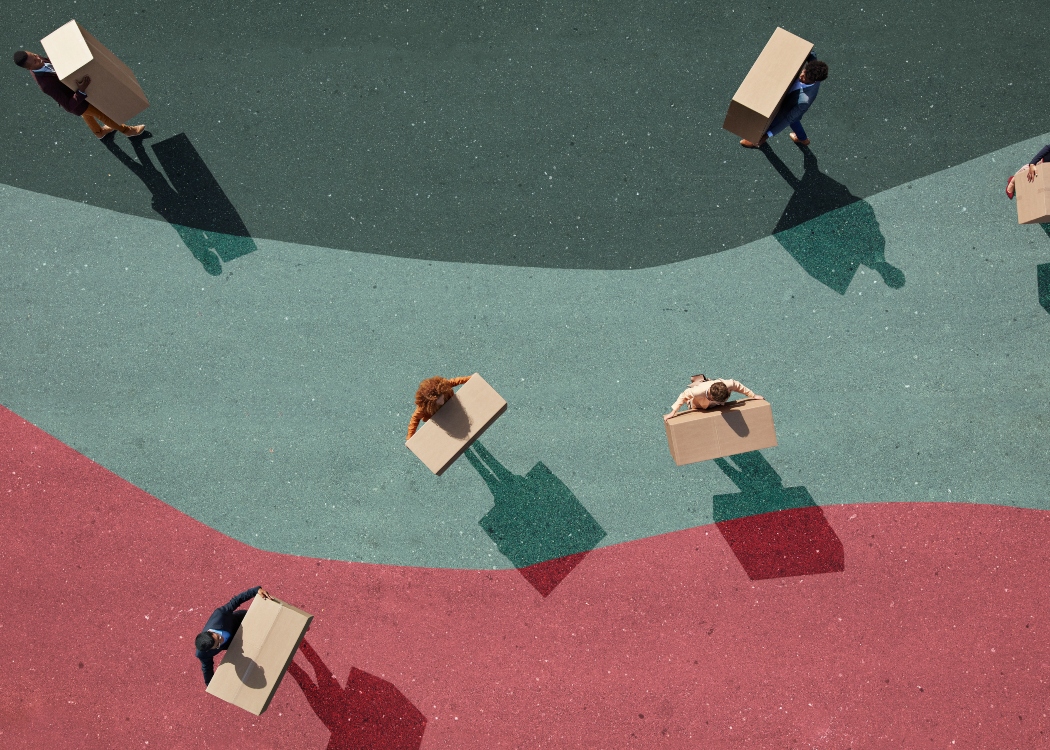 Business people carrying boxes