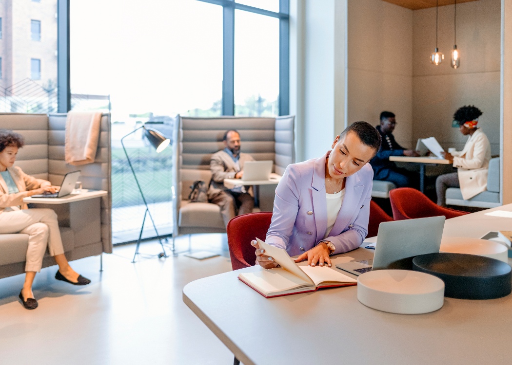 Workers in a open desk environment